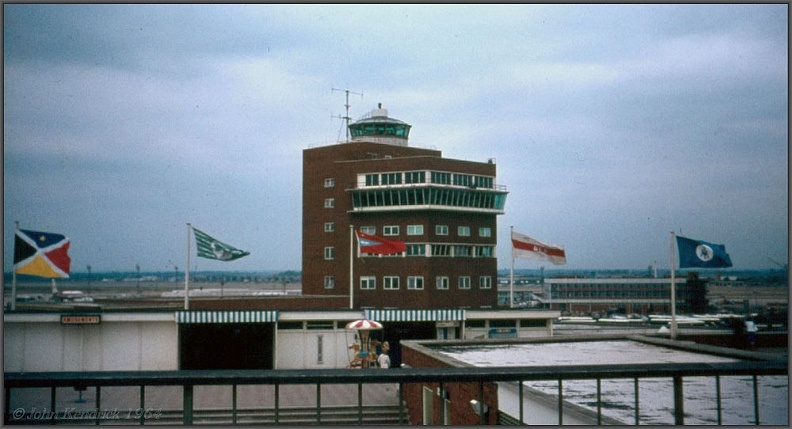 Heathrow flags - 1964.09_crop+wm+bdr_1000w.jpg