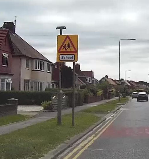Another non compliant yellow backed road sign